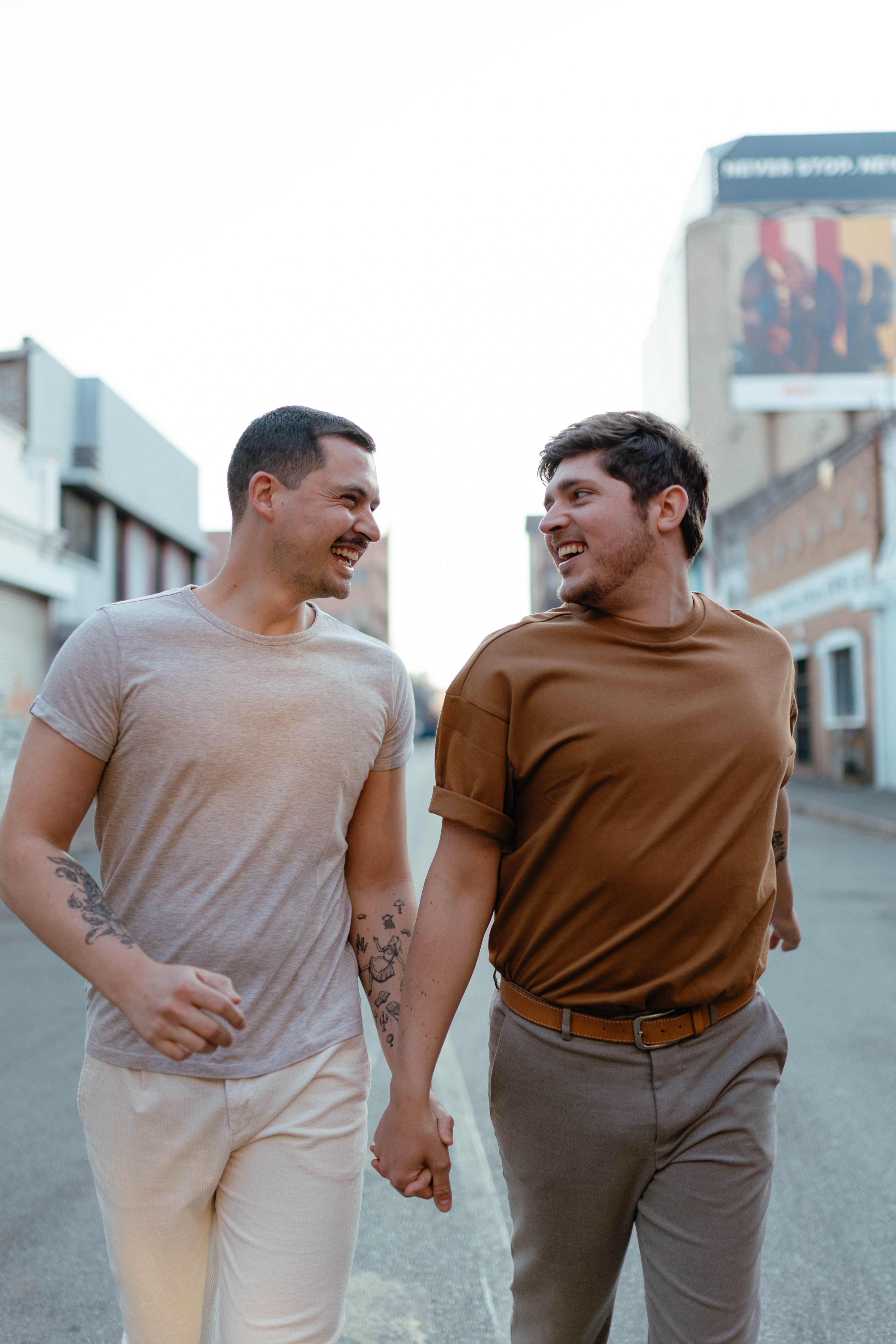gay couple happy together on their engagement photoshoot in maboneng, johannesburg