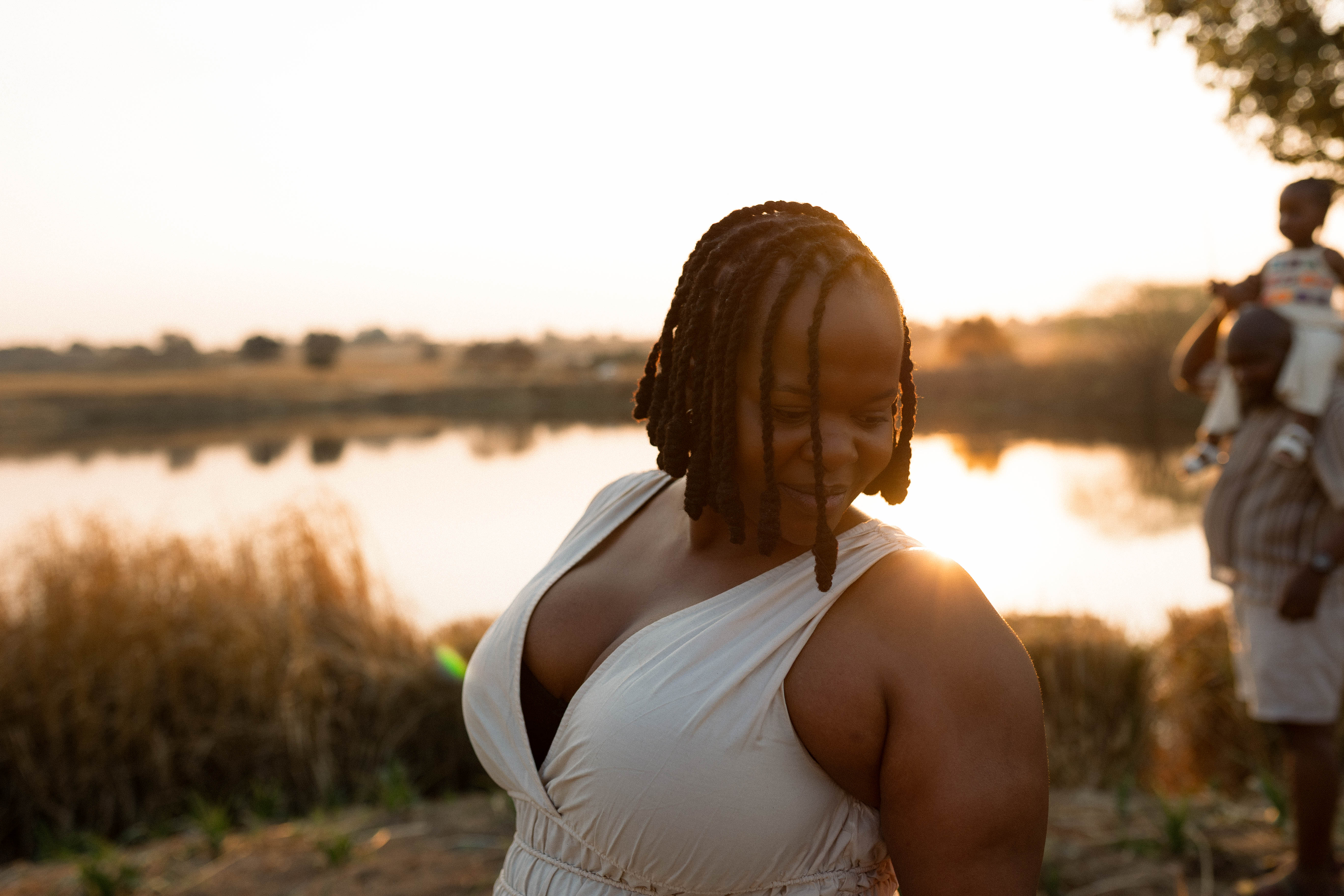mom in the golden light at lewis family farms