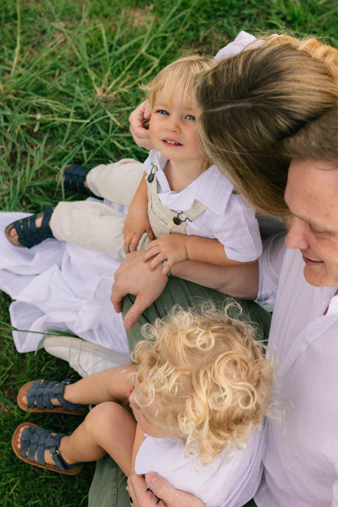 Young family embracing during golden hour session by Samantha Steele Photography Johannesburg