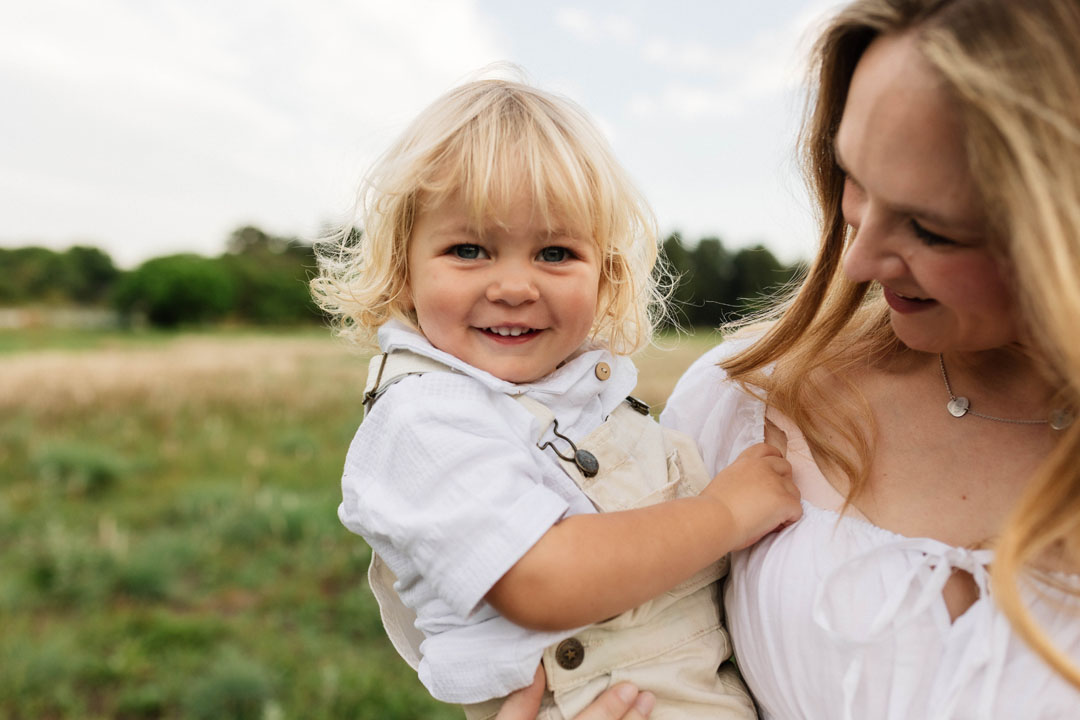 Natural light image capturing emotive storytelling moment during family photography session Gauteng